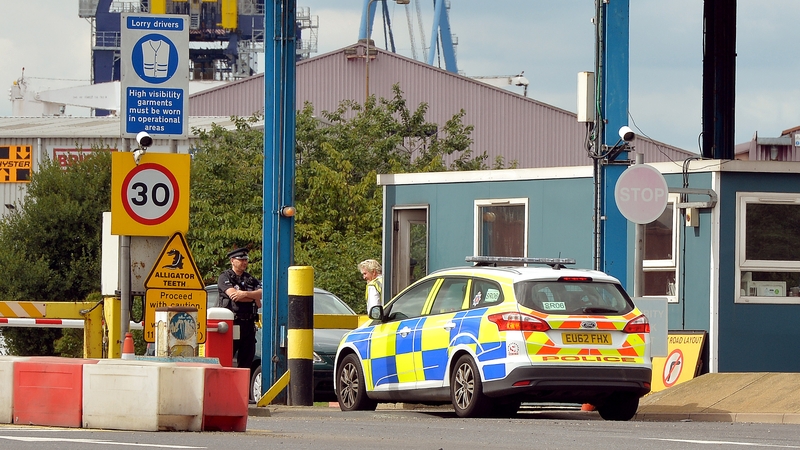 One man died and 34 others were taken to hospital after being found in a container