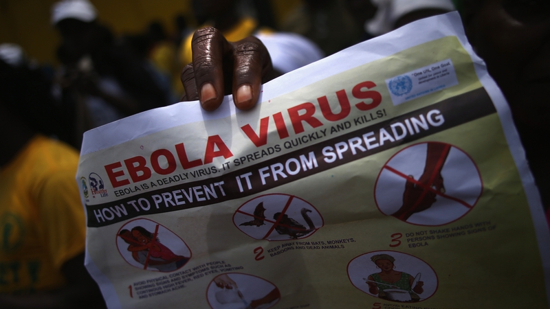 Public health advocates stage an Ebola awareness and prevention event in Monrovia, Liberia