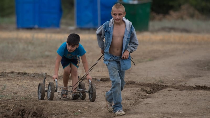 Children from eastern Ukraine, play in a refugee camp near Donetsk