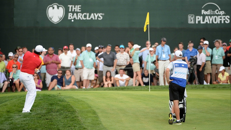 Jason Day plays his fourth shot on the 17th hole