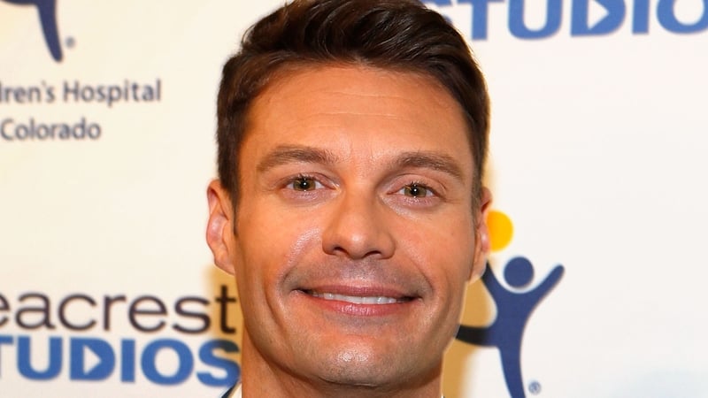 Ryan Seacrest has fallen for a raven haired little beaut
