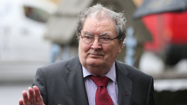Former SDLP leader John Hume arrives for the funeral