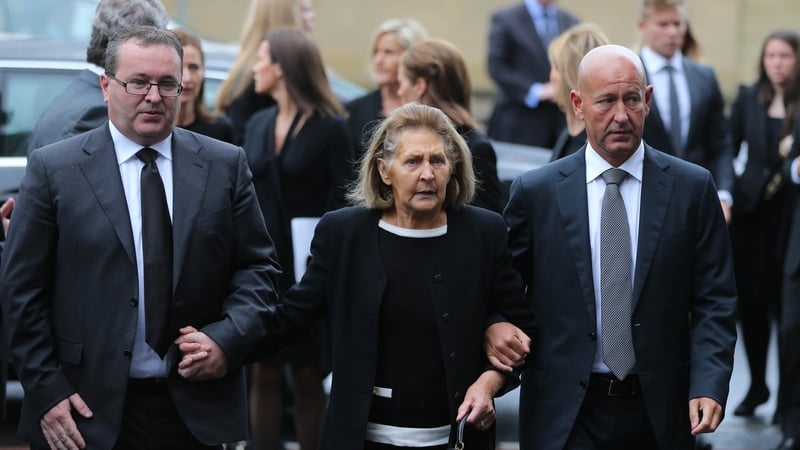 Albert Reynolds's wife, Kathleen, and family arrive for the funeral mass