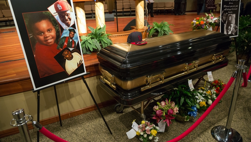 Brown's body lay in a black and gold casket in Friendly Temple Missionary Baptist Church