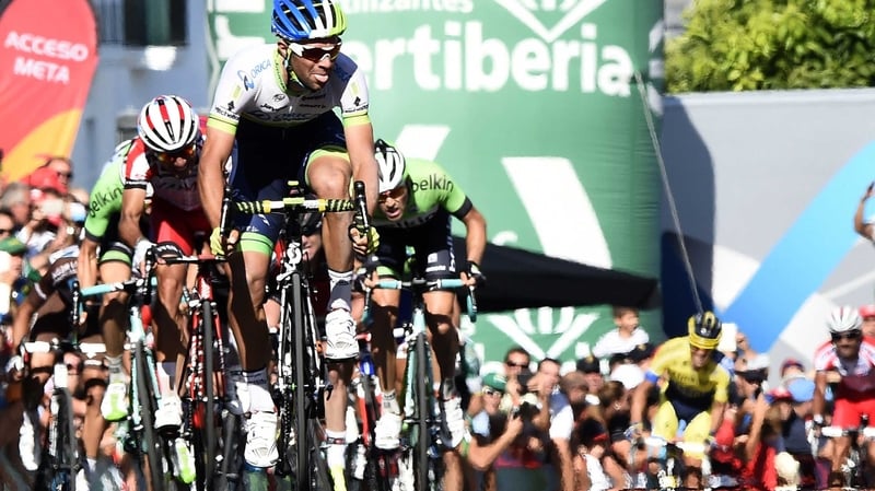 Australian rider Michael Matthews of Orica GreenEdge reacts as he crosses the finish line just ahead of Dan Martin