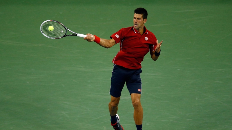 Novak Djokovic returns against Diego Schwartzman