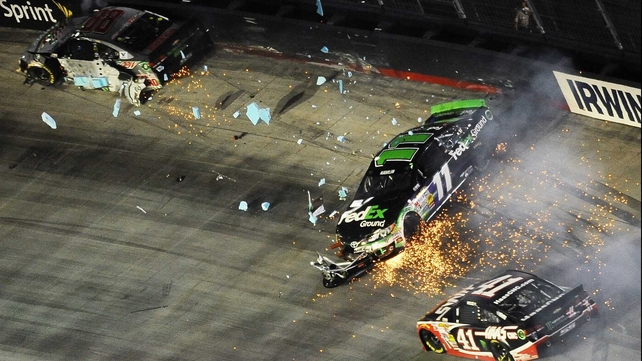 A three-way crash at the NASCAR Sprint Cup Series Irwin Tools Night Race at Bristol Motor Speedway, Tennessee