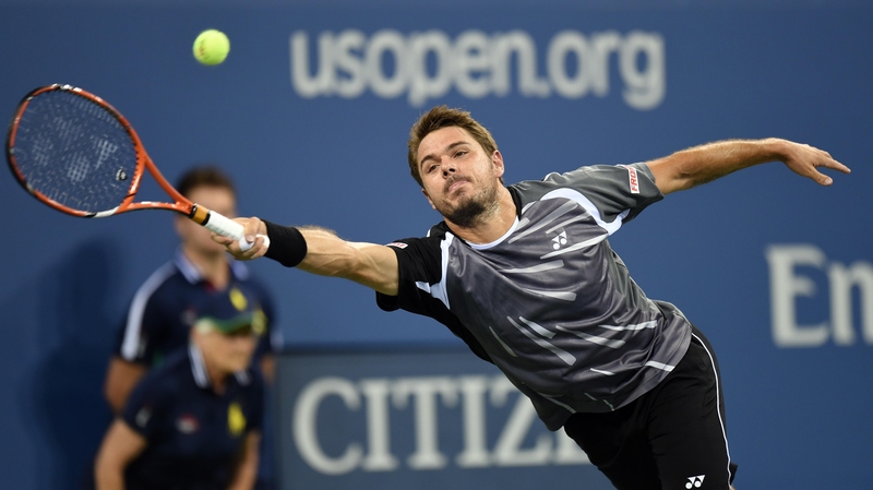 Stan Wawrinka stretches for a ball against Thomaz Bellucci
