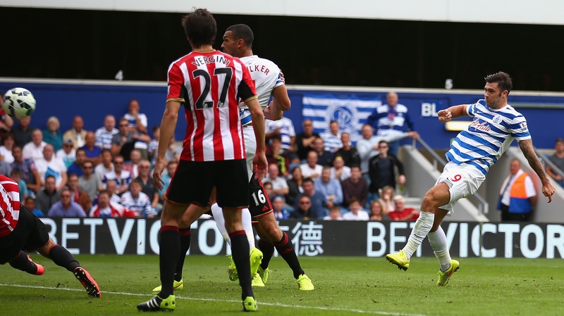 QPR goalscorer Charlie Austin rifles home his shot at Loftus Road