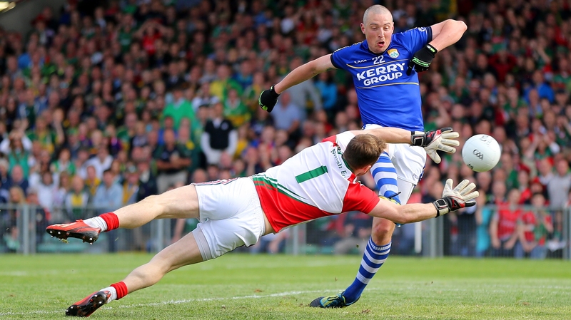 Kerry's Kieran Donaghy scores a goal past Mayo goalkeeper Robert Hennelly
