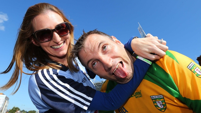 A Dublin fan gets to grips with a Donegal counterpart but the roles were reversed during the game