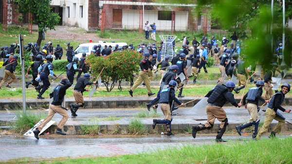 Police retreat as protesters near the PM's residence