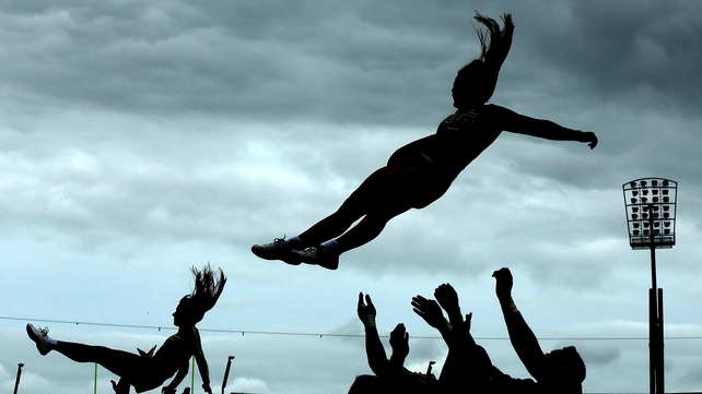 The University of Central Florida cheerleaders take to the air in Croke Park