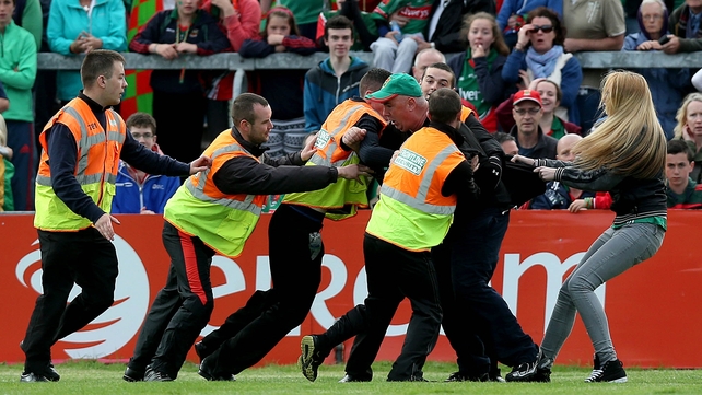 One Mayo fan was particularly unimpressed with the officials and was invited to leave the pitch by the stewards