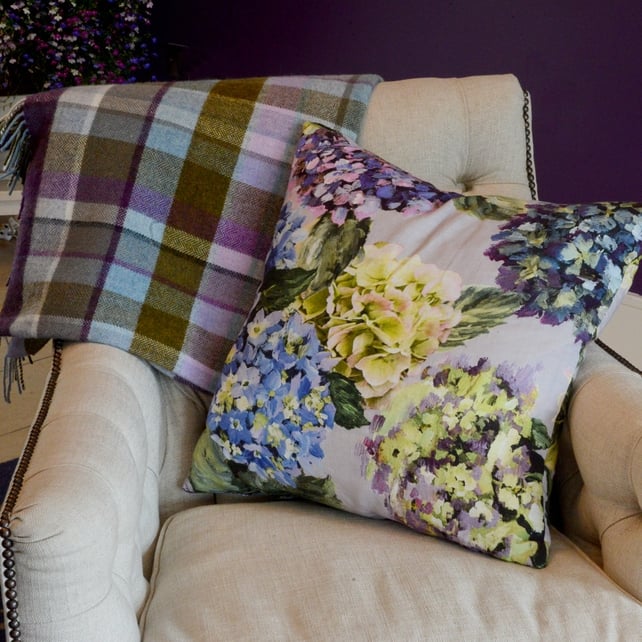 Throw: €59.95 www.avoca.ie 
Hydrangea Cushion: €78 each www.ryleandcompany.ie | Armchairs: Trafalgar chair grand tour collection (€899) www.dfs.ie