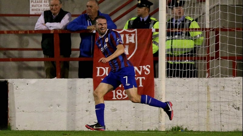 Conan Byrne wheels away after scoring the only goal of the game at Tolka Park