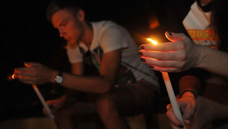 University of Central Florida students hold a candle light vigil for journalist Stephen Sotloff