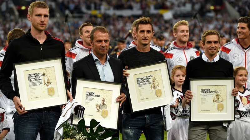 Per Mertesacker (l) was joined by Germany's assistant coach Hansi Flick, record goalscorer Miroslav Klose and former captain Philipp Lahm for a presentation following their departure from the international scene