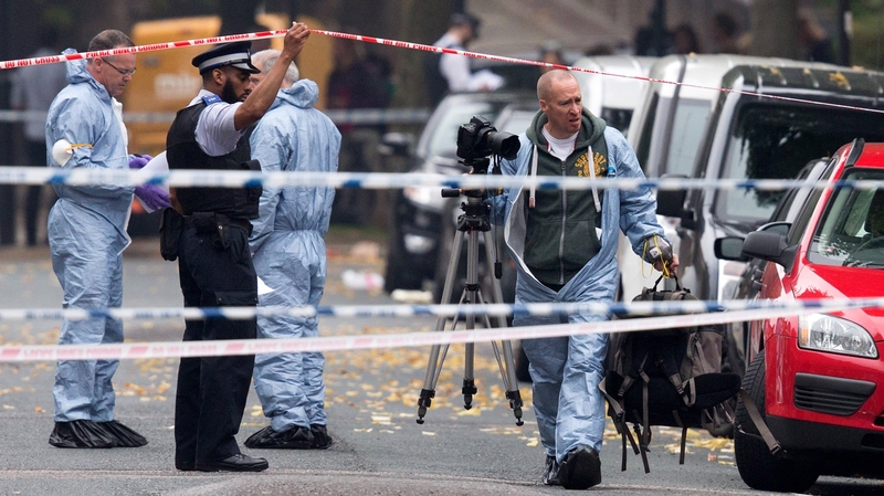 Forensic investigators prepare to examine the property in Islington, north London