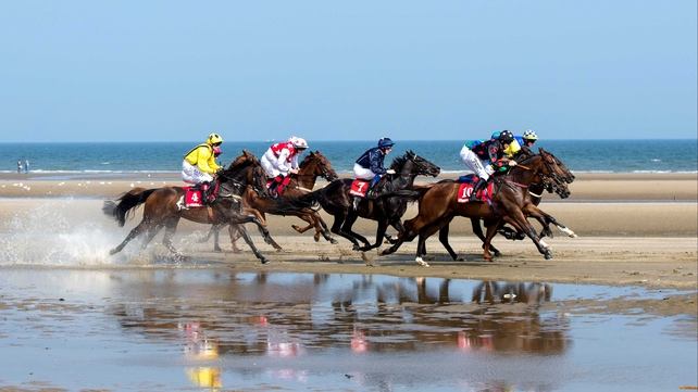 Horses race on the beach at Laytown