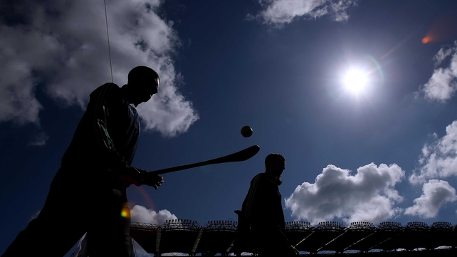 Limerick players arrive and walk the pitch ahead of the minor final