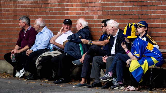 Fans in discussion before the game
