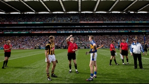 Kilkenny's JJ Delaney and Brendan Maher of Tipperary with referee Barry Kelly at the coin toss