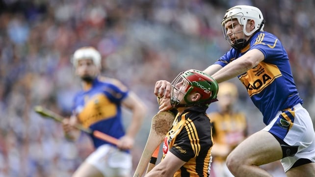 Eoin Larkin comes in for attention from Brendan Maher