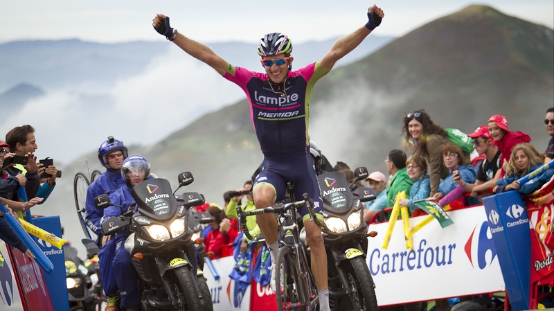 Przemyslaw Niemiec crosses the finish line