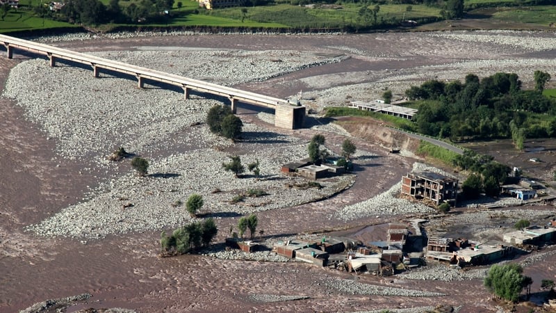 The floods washed away a section of a bridge in Jammu