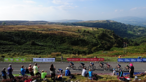 The peloton make their way up the final climb during stage three from Newtown to Abergavenny in Wales