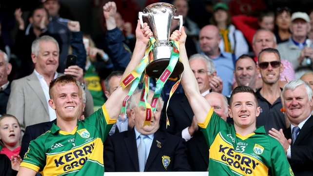 6 July - Fionn Fitzgerald and Kieran O’Leary lift the Munster cup after a facile 0-24 to 0-12 victory over the Rebels