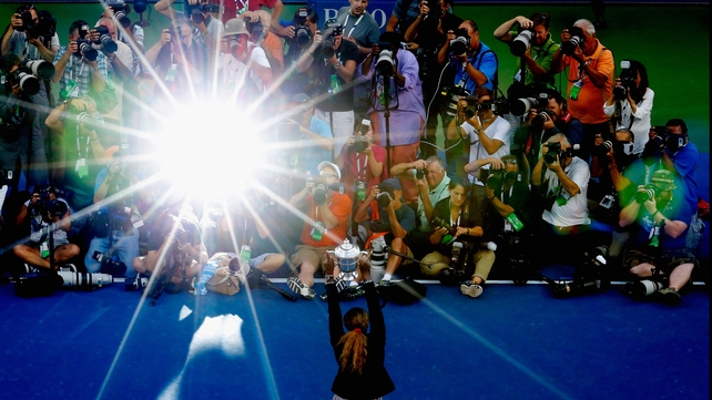 The media photograph Serena Williams after her US Open victory