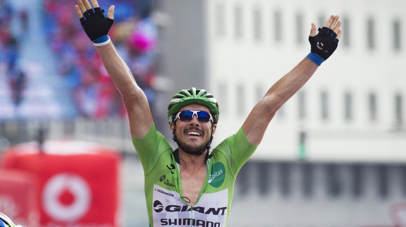 John Degenkolb celebrates as he crosses the line first, again