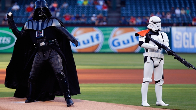 Darth Vader throws out the ceremonial first pitch before the Seattle Mariners take on the Texas Rangers in Arlington