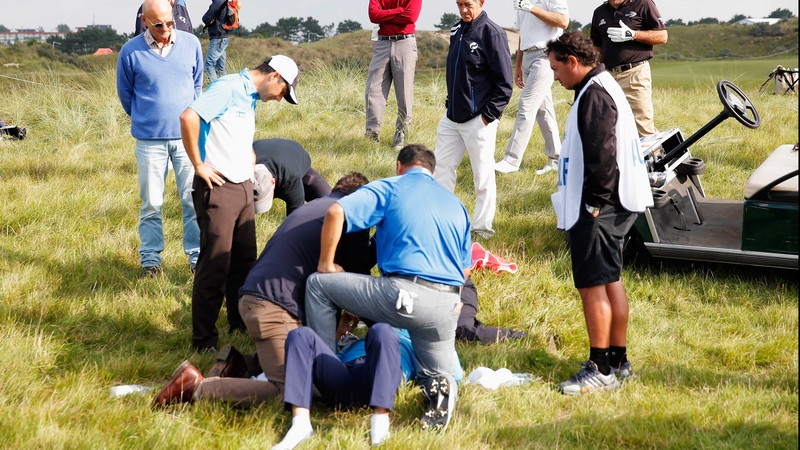 Fabrizio Zanotti receives treatment on the 16th fairway