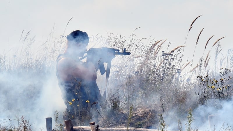 A Ukrainian paratrooper takes part in military drills prior to leaving for the east of the country for an 'anti-terrorist' operation
