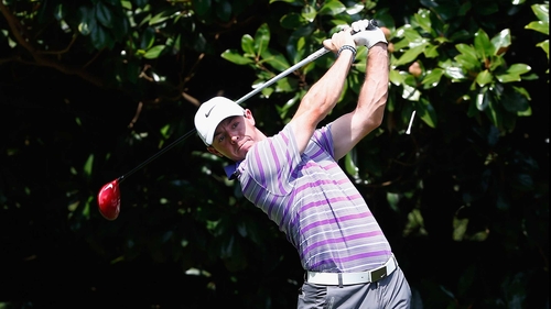 Rory McIlroy hits his tee shot on the fourth hole at at the East Lake Golf Club
