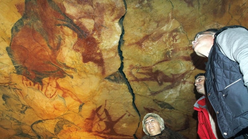 People visit a replica of the Cave of Altamira at the Altamira Museum in Santillana del Mar, Cantabria