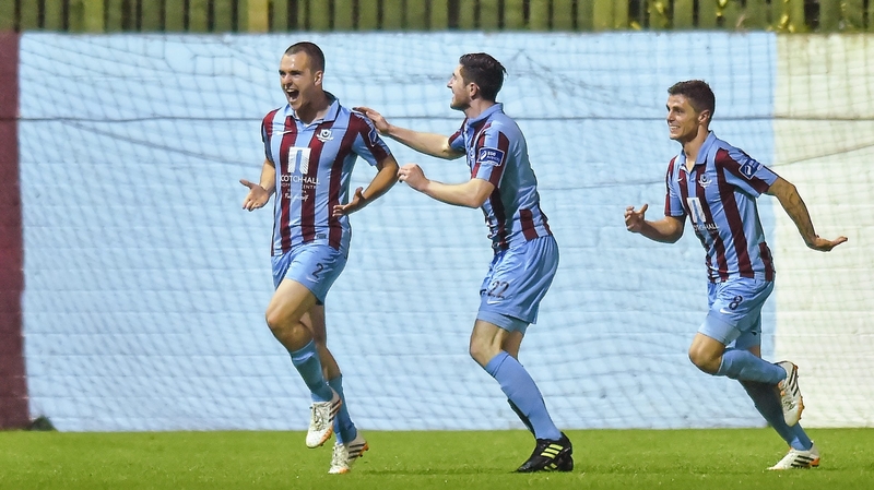 Drogheda's Mick Daly (l) celebrates after scoring his side's second goal with team-mates Ciaran McGuigan and Gavan Holohan