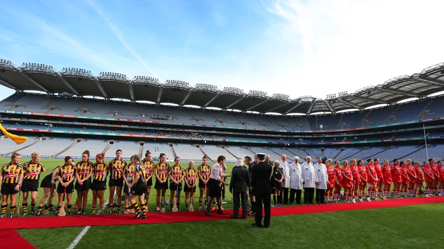 President of the Camogie Association Aileen Lawlor and President of Ireland Michael D Higgins are introduced to the Kilkenny and Cork players before the All-Ireland senior final
