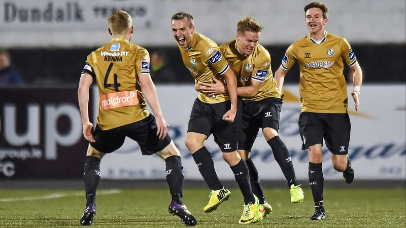 Shamrock Rovers players flock to team-mate Karl Sheppard as he celebrates his second goal at Oriel Park