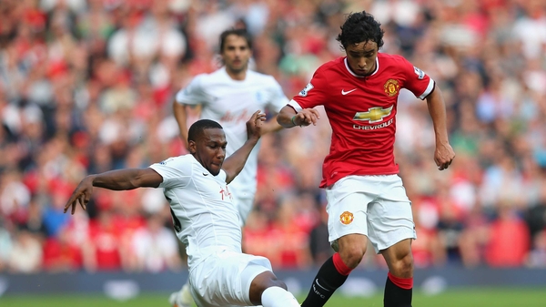 Rafael of Manchester United is tackled by David Hoilett of QPR - Rafael received a frank judgement from Eamon Dunphy