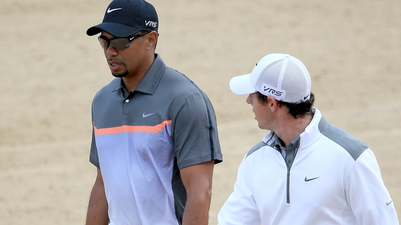 Tiger Woods would take the attention and pressure away from Rory McIlroy, according to Paul McGinley