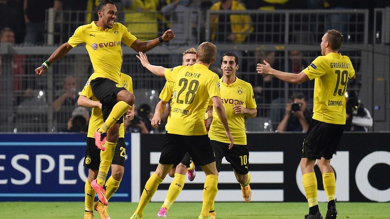 Emerick Aubameyang celebrates scoring with his team mates