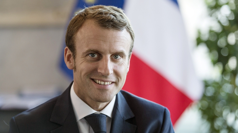 Euro zone growth will depend partly on Emmanuel Macron winning the French presidency next month, a survey says
