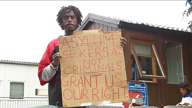 They are objecting to delays in processing their applications for asylum