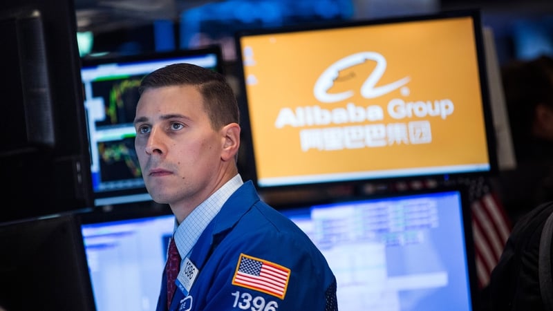 Chinese giant's first set of results since its record-setting $25 billion listing in September