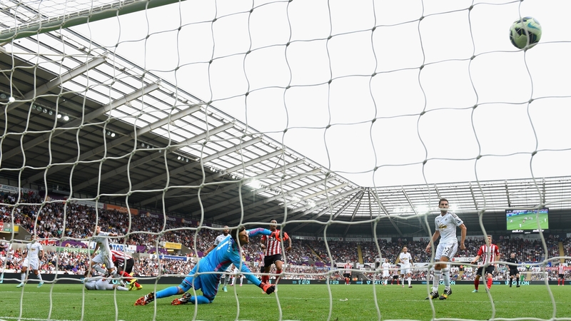 Victor Wanyama watches his shot hit the back of the onion sack