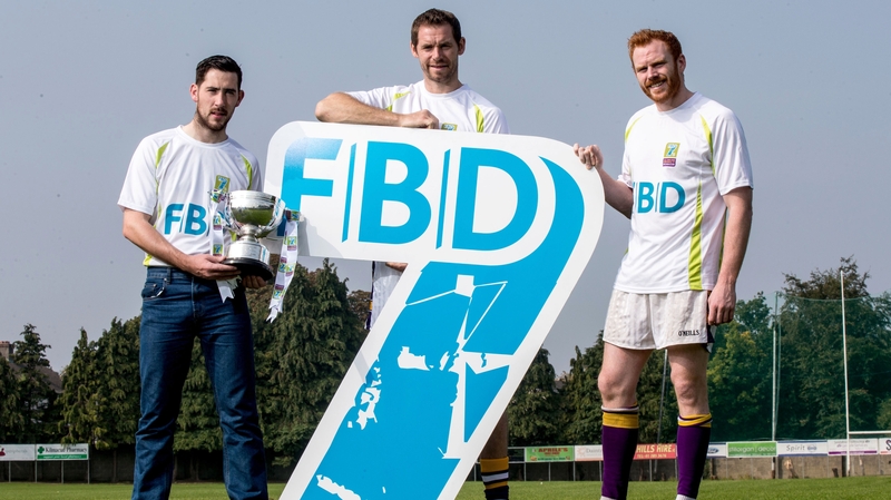 Mark McHugh, Darren Magee and Mark Vaughan pose with the All-Ireland Sevens trophy